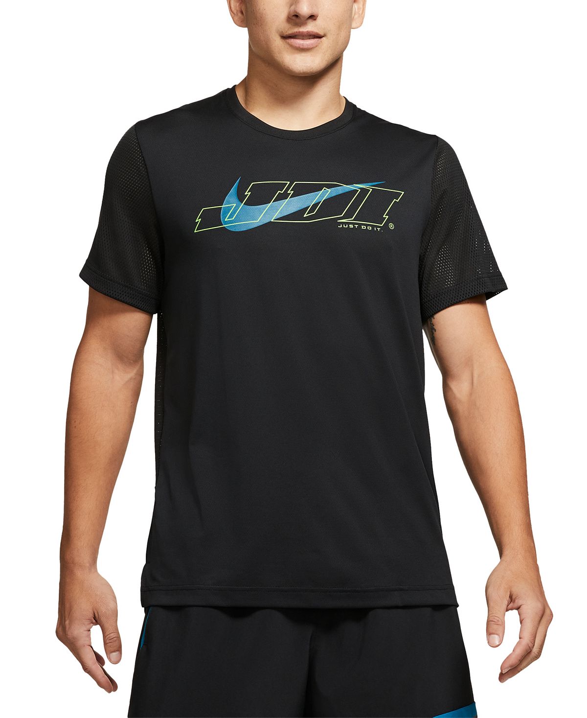 black nike shirt with green swoosh